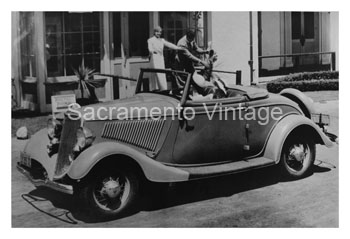 [01934-24] PICTURE-CABRIOLET WITH TOP DOWN